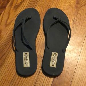 Gray flip flops